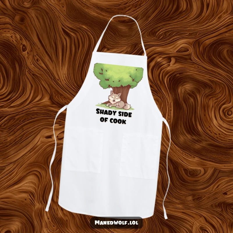 Funny apron with a contented maned wolf resting peacefully under a large, shady tree.