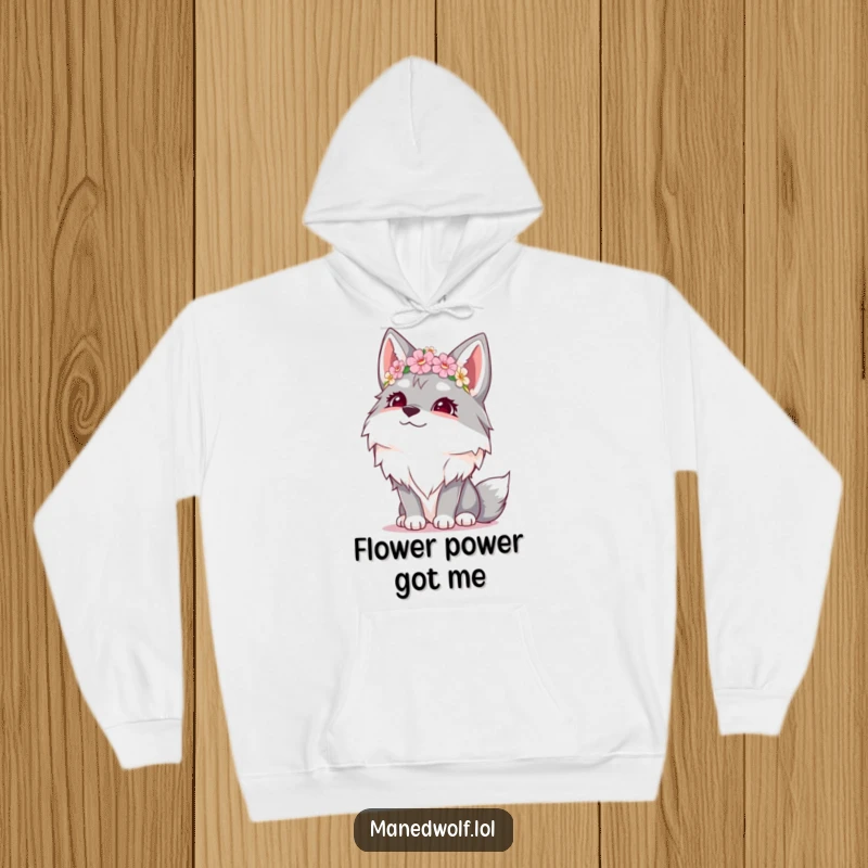 Funny hoodie showcasing a giggling maned wolf with a delicate flower crown, eyes uplifted in happy contemplation.