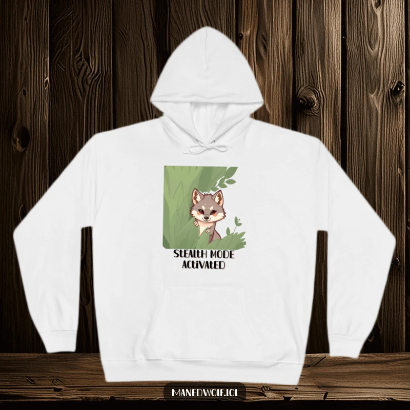 Funny hoodie featuring a maned wolf slyly peeking out from behind a tall, leafy bush.