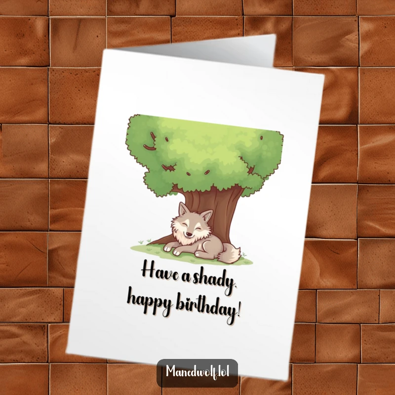 Free Printable Birthday Card: A contented maned wolf rests peacefully under a large shady tree, conveying calm and serenity.
