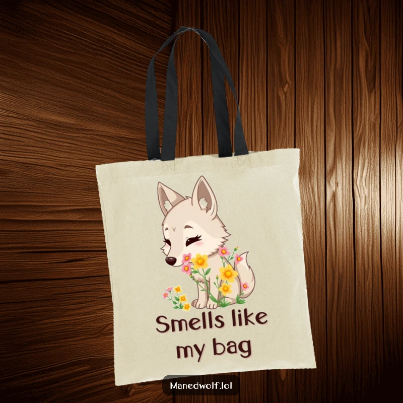 Funny maned wolf tote bag showing a character delightedly sniffing a bouquet of fragrant wildflowers, adding charm to your day.